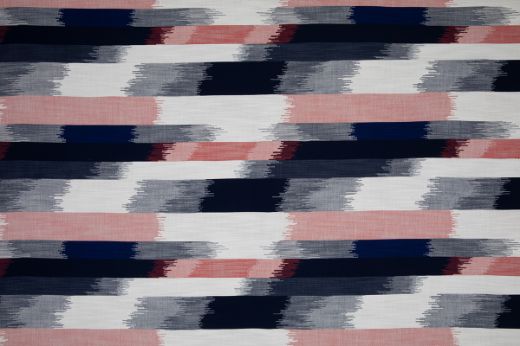 SOMBRE Perennials Performance Ikat Woven Fabric in a red, navy and dark indigo colours. Designed for outdoor upholstery and furniture.