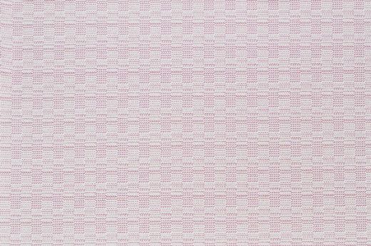 Outdoor performance fabric with woven textures in bright pink and white colours 