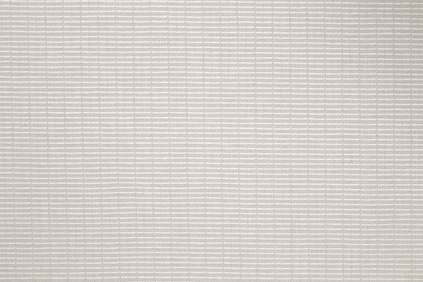 An outdoor, performance woven stripe in natural and white colours