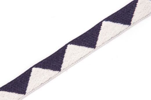 Big Top Tape fabric trim Dark Indigo featuring a whimsical geometric pattern of dark navy blue and white triangles, which can be added to curtains, drapery, upholstery or accessories.  