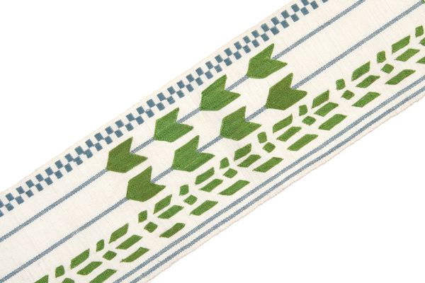 Geometric shapes in green with blue stripes going vertically and check at one side.