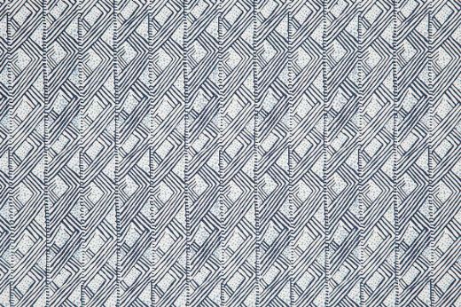 Belge geometric and dotty linen fabric in shades of dark indigo on a white background, featuring a repetitive, playful abstract small-scale pattern, designed by Barron and Larcher for Christopher Farr Cloth.