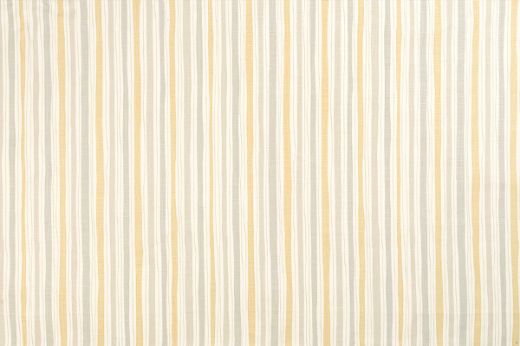And Objects Boundary striped linen fabric in lemon, grey and neutral hues, featuring a playful abstract stripe pattern, designed by And Objects for Christopher Farr Cloth.