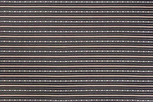Bow and Arrow Woven Fabric by Kit Kemp in dark indigo with white and denim blue stripes, accented by red dotted stripes, perfect for upholstery, curtains, and cushions, offering bold texture and design.