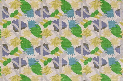 Repeated design of cactus flowers in the 'Green' colourway, part of the Cactus Flower collection by Commune for Christopher Farr Cloth, featuring vibrant green and denim blue hues.