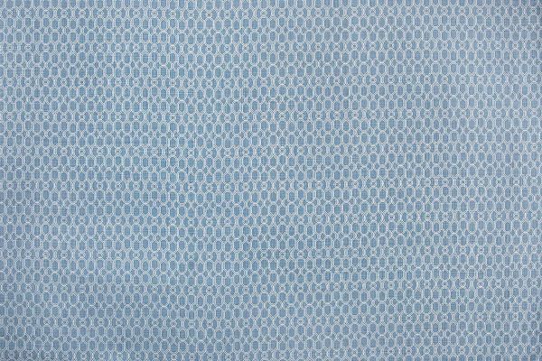 Chiselled Circle geometric printed linen fabric in denim blue, designed by And Objects for Christopher Farr Cloth.