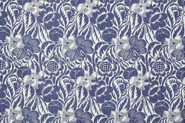 Decorative linen fabric in rich indigo blue featuring expressive floral motifs from the Raoul Dufy archive, reimagined by Christopher Farr Cloth.
