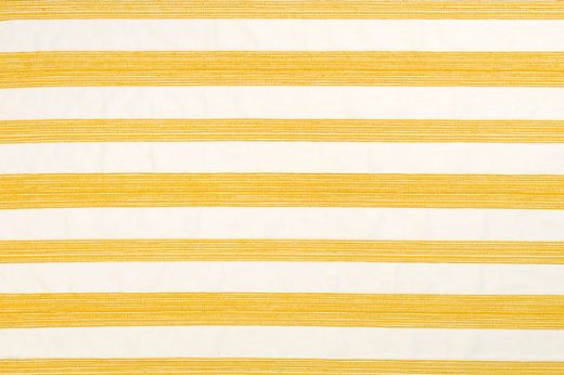 Nomad Woven Fabric in Lemon – wide-stripe design in soft yellow and natural tones, ideal for upholstery, blinds, and tailored soft furnishings.