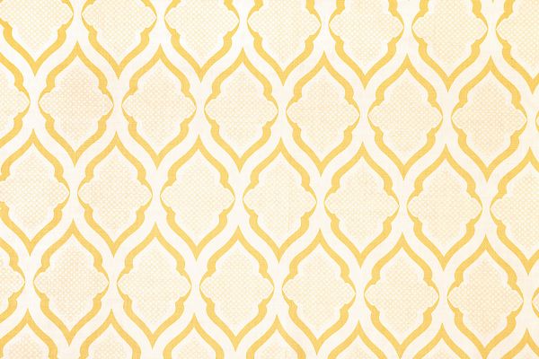 Ravenna Printed Fabric in Lemon – a vibrant geometric print in soft yellow on natural linen, designed by Michael Szell for a fresh, sunlit interior accent.