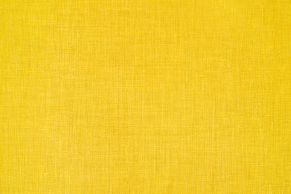 Soprano plain coloured printed linen fabric in vibrant yellow colour. Ideal for upholstery, curtains, and home decor accessories.