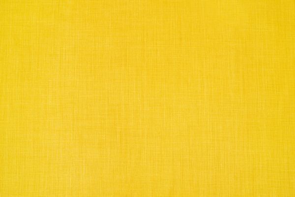 Soprano plain coloured printed linen fabric in vibrant yellow colour. Ideal for upholstery, curtains, and home decor accessories.