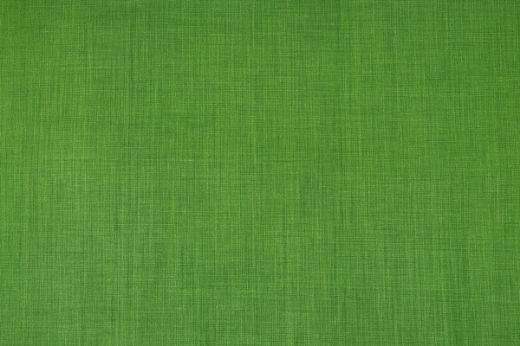 Soprano plain coloured printed linen fabric in bright green colour. Ideal for upholstery, curtains, and home decor accessories.