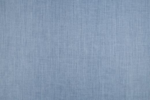 Soprano plain coloured printed linen fabric in denim colour. Ideal for upholstery, curtains, and home decor accessories.