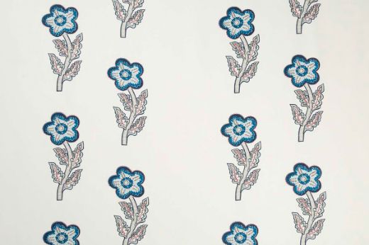 Large scale flowers in blues, greys and hints reds. Designed by Kit Kemp.