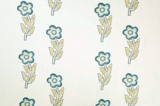 Large scale flowers in blues and yellows. Designed by Kit Kemp.