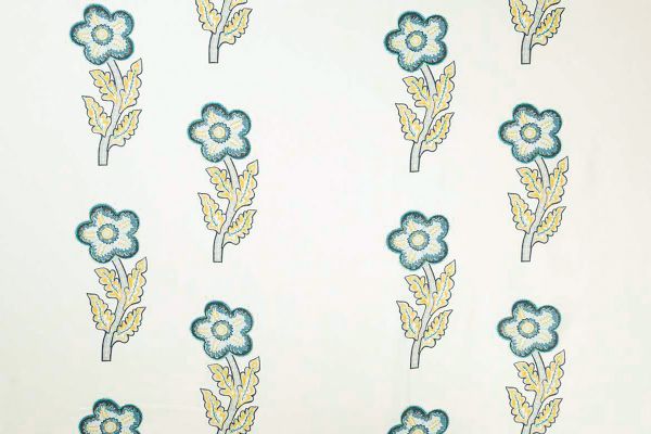 Large scale flowers in blues and yellows. Designed by Kit Kemp.