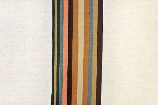 Striped printed fabric in warm browns, denim pale greens and khaki.