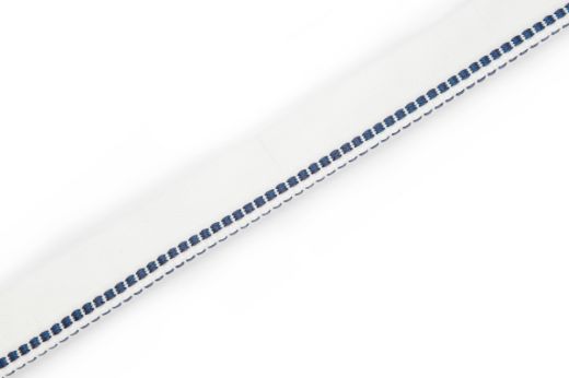 Hopscotch Performance Piping in Azzurro, a soft blue piping with a woven square pattern, adding a serene and resilient touch to high-traffic areas and outdoor furniture.