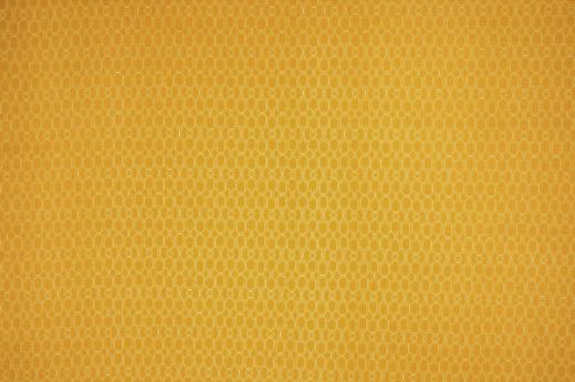 Chiselled Circle geometric printed linen fabric in lemon yellow, designed by And Objects for Christopher Farr Cloth.