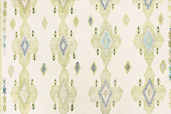 Geometric shapes in light lime green tones with pops of blues and teals.