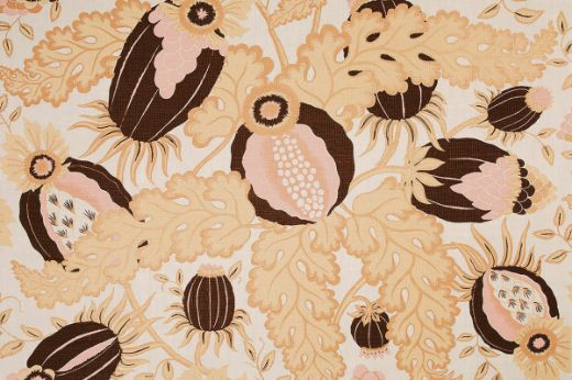 Carnival printed fabric in Copper colour, gold yellows and dark maroons. 