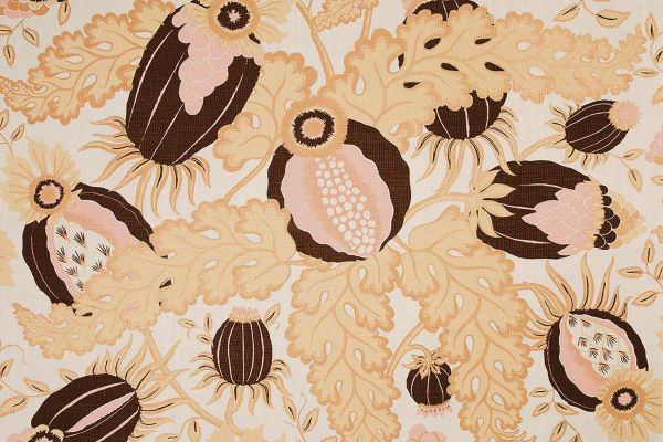 Carnival printed fabric in Copper colour, gold yellows and dark maroons. 