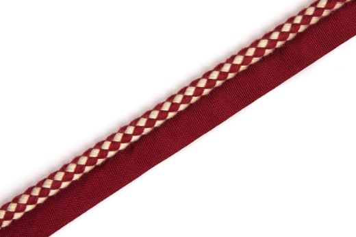 Circus Piping Trim in Ruby, offering a rich two-tone check pattern in burgundy and cream, perfect for adding warmth and sophistication to soft furnishings and custom designs.