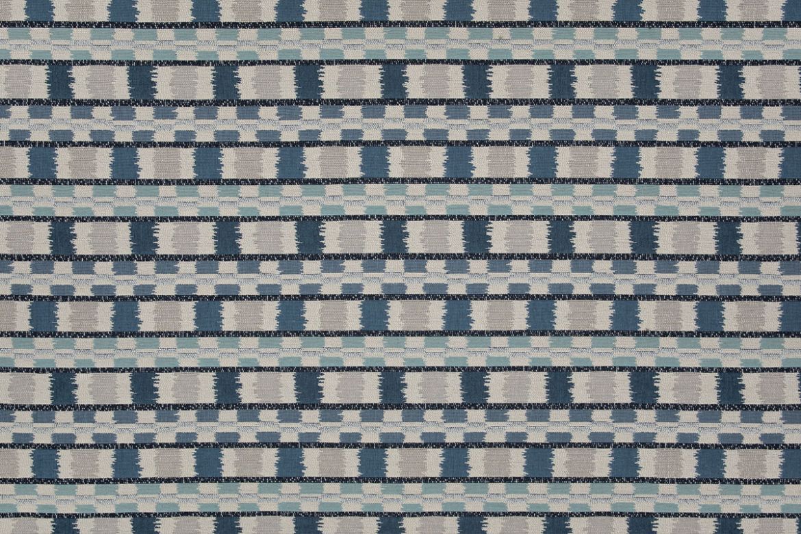 A modern check design in rich denim blue tones, offering a textured, sophisticated surface ideal for contemporary interiors and upholstery.