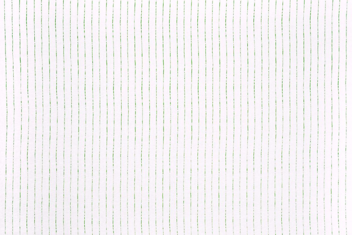 Broken Stripe printed linen fabric in green on a white linen background, featuring a delicate striped pattern that mimics a hand-drawn look.