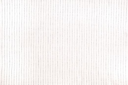 Broken Stripe printed linen fabric in smoke on a white linen background, showcasing a refined, hand-drawn style stripe pattern.