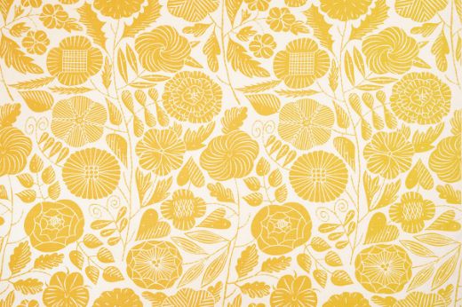 Eden Printed Fabric in Lemon, featuring delicate hand-drawn botanical patterns in vibrant yellow tones over a natural linen background, adding a fresh, cheerful touch to any space.