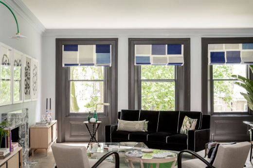 Image of a room designed by Kitesgrove Design with Untiled indigo on the blinds in the living room 