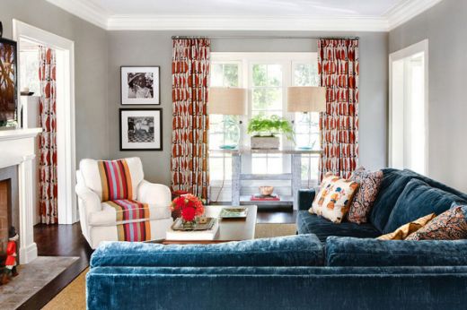 Room design by J.Latter Design, photography by Adam Kaniowski shows a living room with a chair in the corner with Vertical Orange fabric.