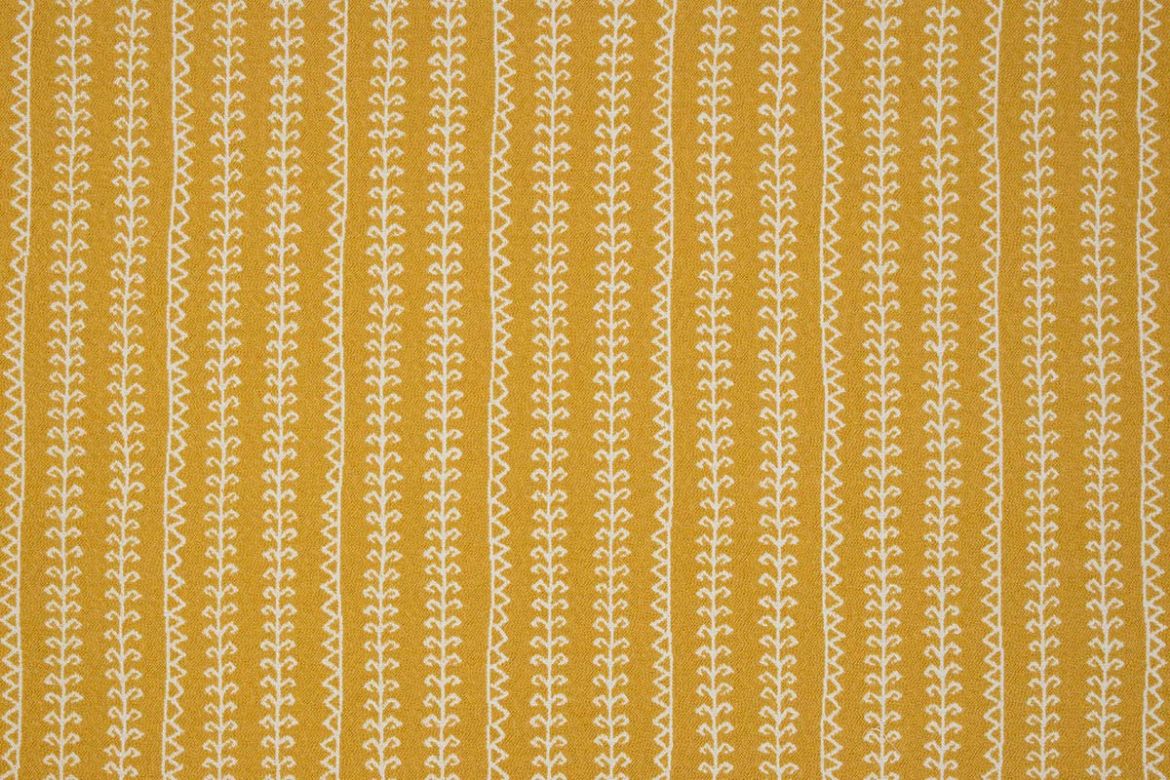 Woven fabric in vibrant yellow with geometric patterned stripes going vertical 