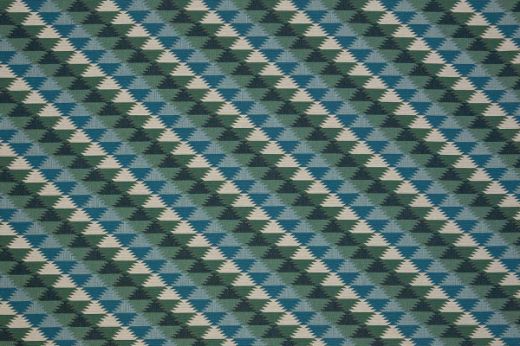 Woven fabric in blues and greens colours in a geometric pattern  
