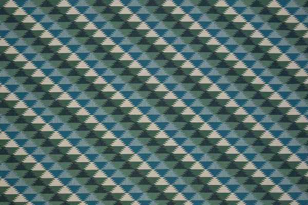 Woven fabric in blues and greens colours in a geometric pattern  