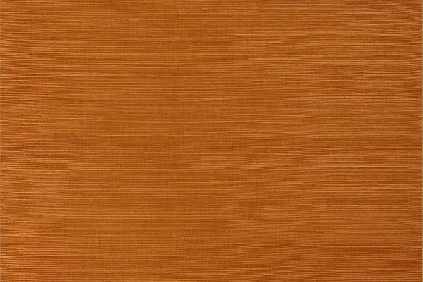 Textured orange-brown sisal grasscloth wallpaper with horizontal weave