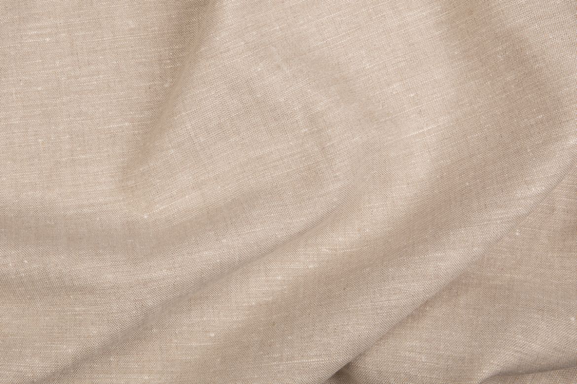Close-up of Bruges fabric in warm taupe with visible weave and soft folds.