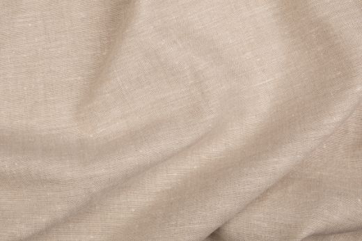 Close-up of Bruges fabric in warm taupe with visible weave and soft folds.