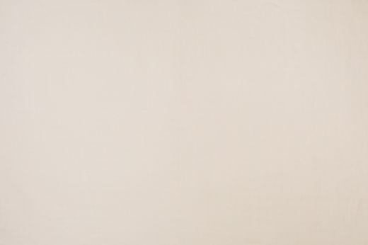 Smooth, flat surface of white Beaumont fabric.