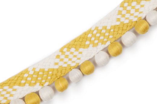 Trim featuring yellow and ivory checks with coordinating yellow and white bobbles.