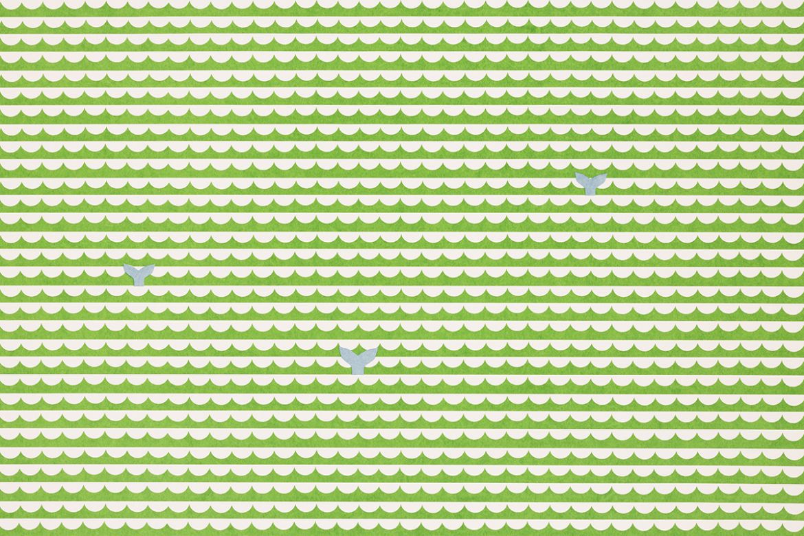 Green and white scalloped pattern with a few light blue whale tails.