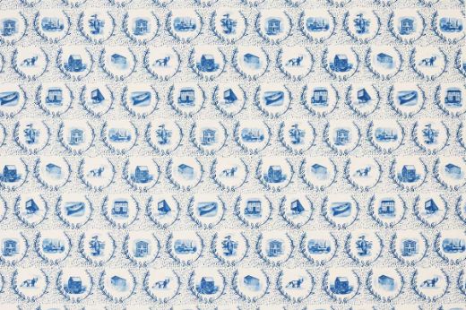 Repeating scenic motifs in classic blue on cream background.