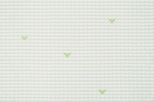 Pale green and white scallop wave pattern with green whale tails.