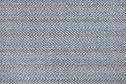 Himba Perennials, performance weave fabric in dark blue tones with a subtle ombré effect creating depth and texture. Inspired by a traditional ethnic weave it has an open weave structure. Designed by Perennials for Christopher Farr Cloth 