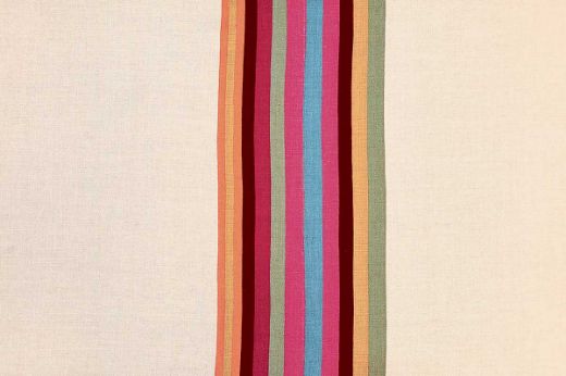 Striped printed fabric in oranges, pinks, blues and green.
