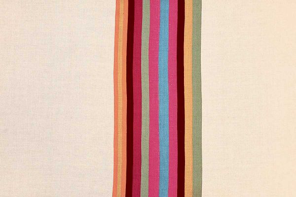 Striped printed fabric in oranges, pinks, blues and green.
