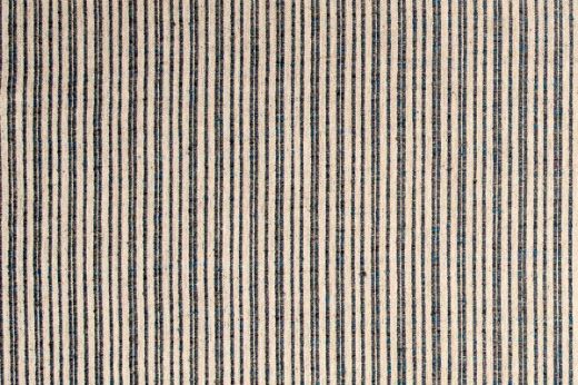 Textured stripe in Indigo with speckles of brighter blues in the yarn 