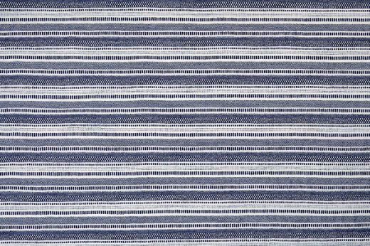 Go With the Flow fabric in Indigo, offering deep, rich blues with playful stripes and layered textures for a modern, dynamic aesthetic.