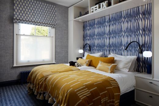 Breakwater indigo blue wallpaper by Christopher Farr Cloth bedroom yellow and Cobalt blue Carden Cunietti photography by Matt Clayton